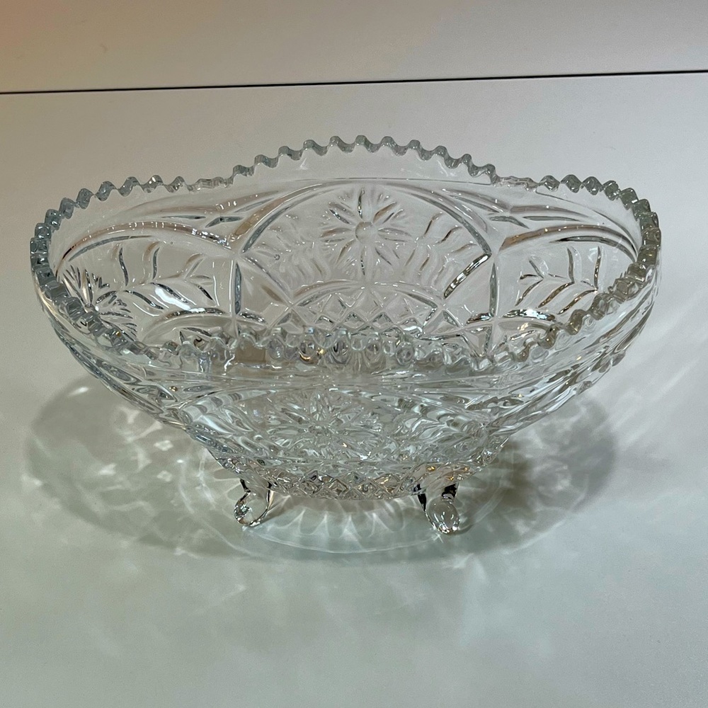 Vintage Pressed glass. Clear. Footed oval dish w/sawtooth edge. 9”L x 5.5” W.